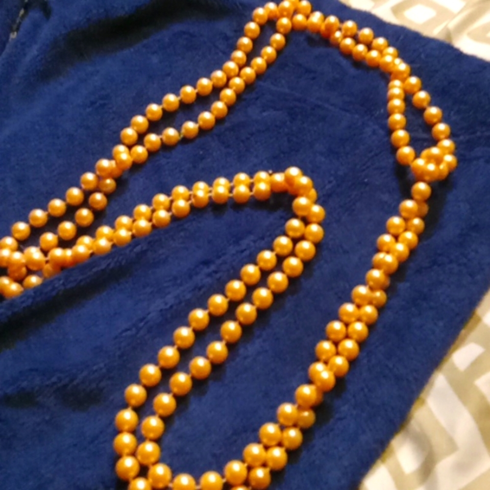 Peach faux pearls